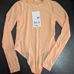 lululemon athletica Peach Long Sleeve Bodysuit